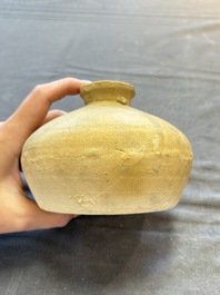 Three cream-glazed bottle vases and two jarlets from the Jepara shipwreck, Dehua or Anxi kilns, Song
