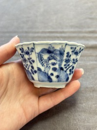 A set of 11 Chinese blue and white cups and saucers with riverscape design, Kangxi