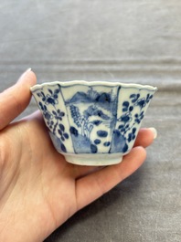A set of 11 Chinese blue and white cups and saucers with riverscape design, Kangxi