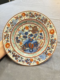 17 Chinese famille rose, Imari-style and European-decorated plates and saucers, Kangxi/Qianlong