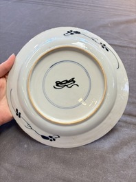 19 Chinese blue and white plates with antiquities, floral, and landscape design, Kangxi