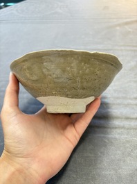 A group of 12 Chinese celadon-glazed bowls with incised floral design from the Jepara shipwreck, Fujian kilns, Song