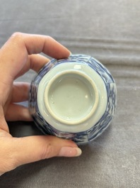 A set of 11 Chinese blue and white cups and saucers with riverscape design, Kangxi