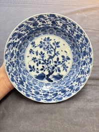 19 Chinese blue and white plates with antiquities, floral, and landscape design, Kangxi