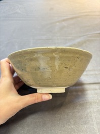 A group of 12 Chinese celadon-glazed bowls with incised floral design from the Jepara shipwreck, Fujian kilns, Song