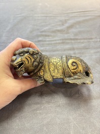 A pair of Chinese bronze Buddhist lions, 19/20th C.