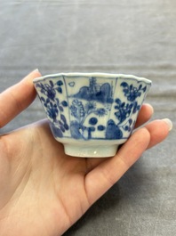 A set of 11 Chinese blue and white cups and saucers with riverscape design, Kangxi