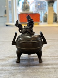 A Chinese archaistic miniature bronze 'qilin' tripod censer and cover, 'ding 鼎', Yuan/Ming