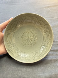 Three Chinese celadon-glazed plates and two bowls from the Jepara shipwreck,  Fujian or Zhejiang kilns, Song