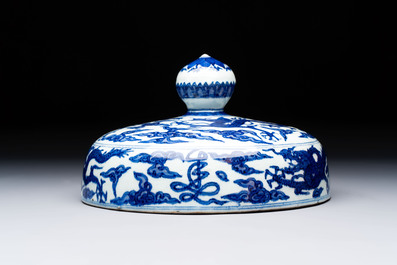 A Chinese blue and white 'dragon among clouds' cover, 20th C.