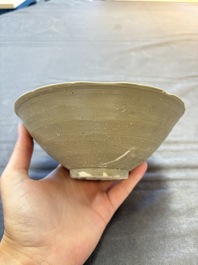 A group of 12 Chinese celadon-glazed bowls with incised floral design from the Jepara shipwreck, Fujian kilns, Song