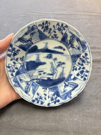 A set of 11 Chinese blue and white cups and saucers with riverscape design, Kangxi