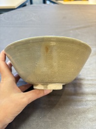 Three Chinese celadon-glazed plates and two bowls from the Jepara shipwreck,  Fujian or Zhejiang kilns, Song