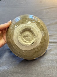 A group of 12 Chinese celadon-glazed bowls with incised floral design from the Jepara shipwreck, Fujian kilns, Song