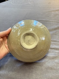 A group of 12 Chinese celadon-glazed bowls with incised floral design from the Jepara shipwreck, Fujian kilns, Song
