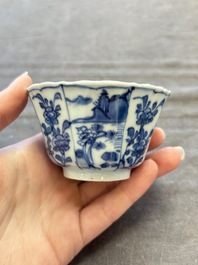 A set of 11 Chinese blue and white cups and saucers with riverscape design, Kangxi