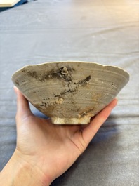 A group of 12 Chinese celadon-glazed bowls with incised floral design from the Jepara shipwreck, Fujian kilns, Song