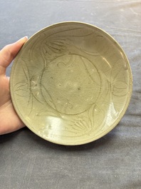 Three Chinese celadon-glazed plates and two bowls from the Jepara shipwreck,  Fujian or Zhejiang kilns, Song