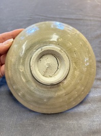 Three Chinese celadon-glazed plates and two bowls from the Jepara shipwreck,  Fujian or Zhejiang kilns, Song
