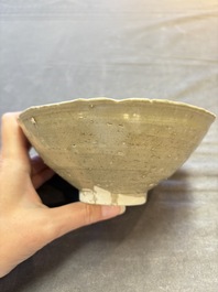 A group of 12 Chinese celadon-glazed bowls with incised floral design from the Jepara shipwreck, Fujian kilns, Song
