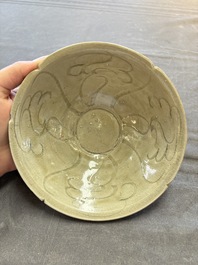 A group of 12 Chinese celadon-glazed bowls with incised floral design from the Jepara shipwreck, Fujian kilns, Song