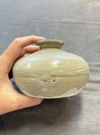 Three cream-glazed bottle vases and two jarlets from the Jepara shipwreck, Dehua or Anxi kilns, Song