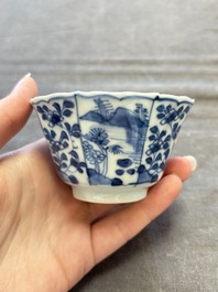 A set of 11 Chinese blue and white cups and saucers with riverscape design, Kangxi