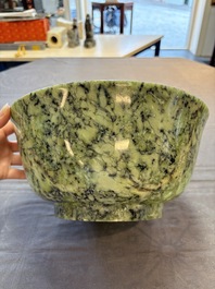 A large Chinese mottled-green serpentine bowl, 20th C.