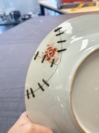 Four Chinese famille rose armorial plates and a dish, Qianlong
