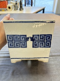 A Chinese blue and white 'chilong' square jardini&egrave;re, 19th C.