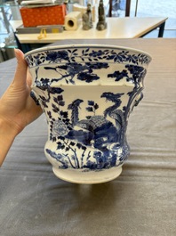 A pair of Chinese blue and white 'birds among flowering branches' jardini&egrave;res, 19th C.