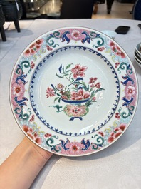 Four Chinese famille rose 'riverscape' plates and five 'flower basket' plates, Qianlong