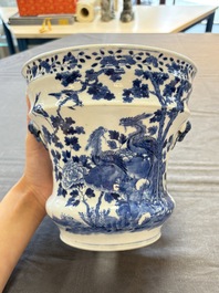 A pair of Chinese blue and white 'birds among flowering branches' jardini&egrave;res, 19th C.