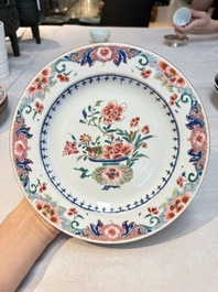 Four Chinese famille rose 'riverscape' plates and five 'flower basket' plates, Qianlong