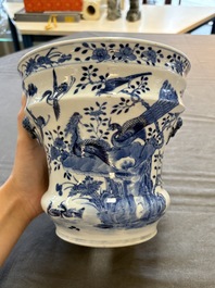 A pair of Chinese blue and white 'birds among flowering branches' jardini&egrave;res, 19th C.
