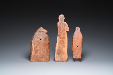 Three carved wooden sculptures of the Pensive Christ, Antonius the Great and a Saint, 16th C.