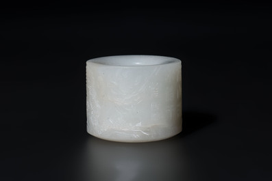A fine Chinese white jade inscribed archer ring, Zigang 子岡 mark, 18th C.