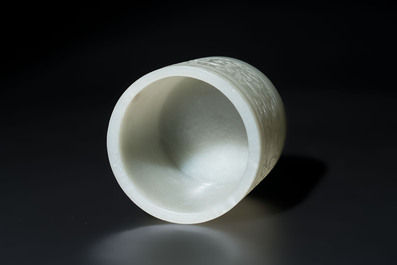 A rare Chinese archaistic jade 'chilong' tripod brush pot, 18th C.