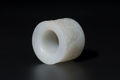 A fine Chinese white jade inscribed archer ring, Zigang 子岡 mark, 18th C.