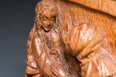 A carved oak retable fragment depicting 'The Visitation', North-Brabant, 15th C.