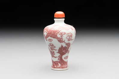 A Chinese blue, white and copper-red 'dragon' snuff bottle, 19th C.