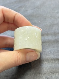 A fine Chinese white jade inscribed archer ring, Zigang 子岡 mark, 18th C.