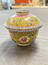 A pair of Chinese yellow-ground Canton enamel covered bowls and two cups, Yongzheng/Qianlong