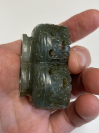 A Chinese reticulated white jade parfumier with spinach-green jade cover and base, Qing