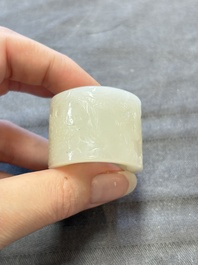 A fine Chinese white jade inscribed archer ring, Zigang 子岡 mark, 18th C.