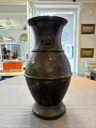A large Chinese archaistic bronze 'hu' vase, Ming
