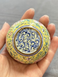 A pair of Chinese yellow-ground Canton enamel covered bowls and two cups, Yongzheng/Qianlong