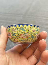 A pair of Chinese yellow-ground Canton enamel covered bowls and two cups, Yongzheng/Qianlong