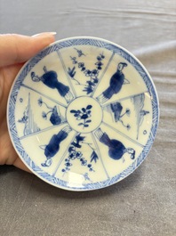 A large collection of 33 Chinese blue, white and Imari-style cups and 43 saucers, 17/19th C.