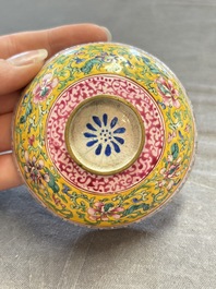 A pair of Chinese yellow-ground Canton enamel covered bowls and two cups, Yongzheng/Qianlong